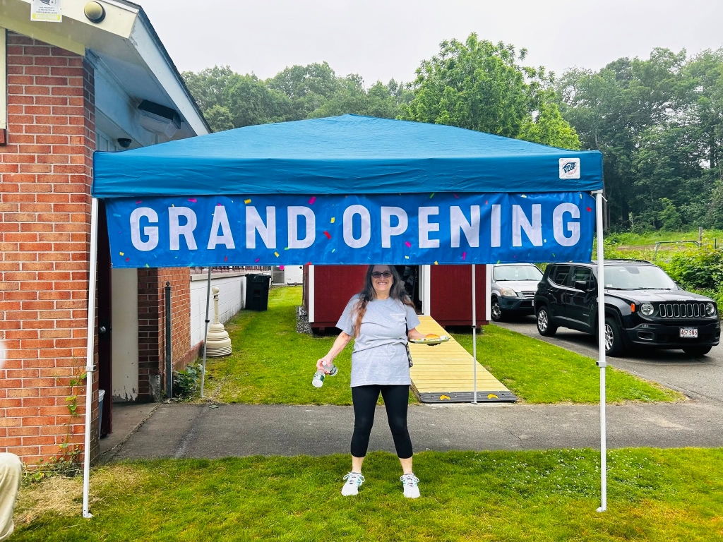 Alison Mallett Welcoming Guests at Grand Opening